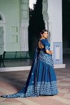 Dance Through Every Celebration in Timeless Crimson Bandhani Lehenga