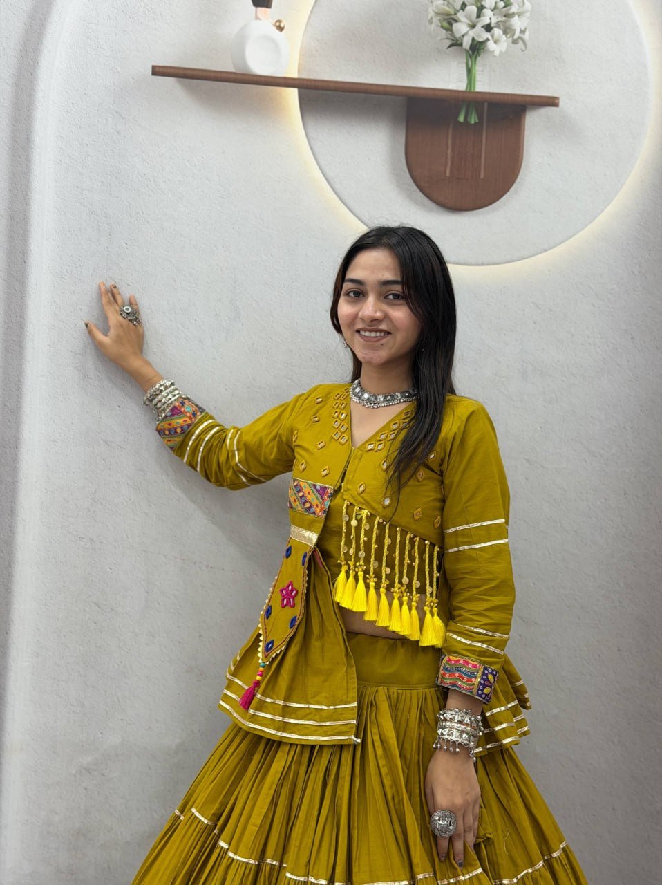 Tiered Flared Lehenga with Tasseled Embroidered Koti Jacket