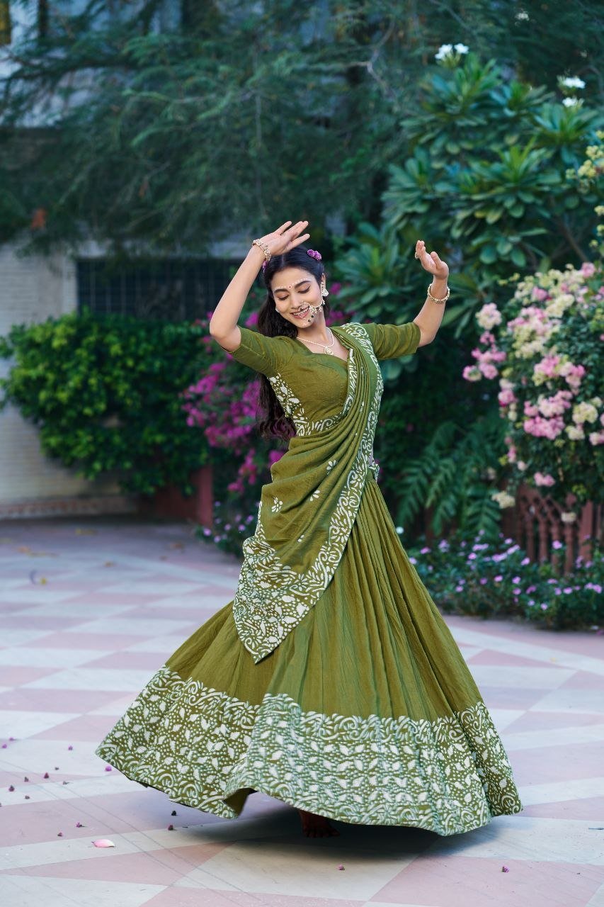 Dance Through Every Celebration in Timeless Crimson Bandhani Lehenga