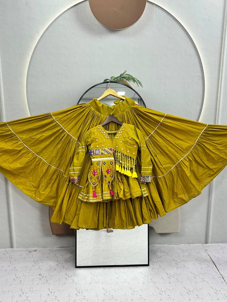 Tiered Flared Lehenga with Tasseled Embroidered Koti Jacket