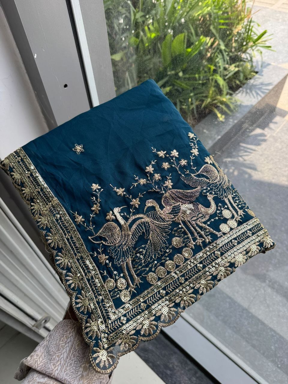 Regal Tradition Embroidered Saree with Ornate Peacock Border