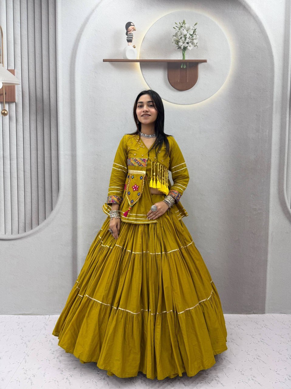Tiered Flared Lehenga with Tasseled Embroidered Koti Jacket