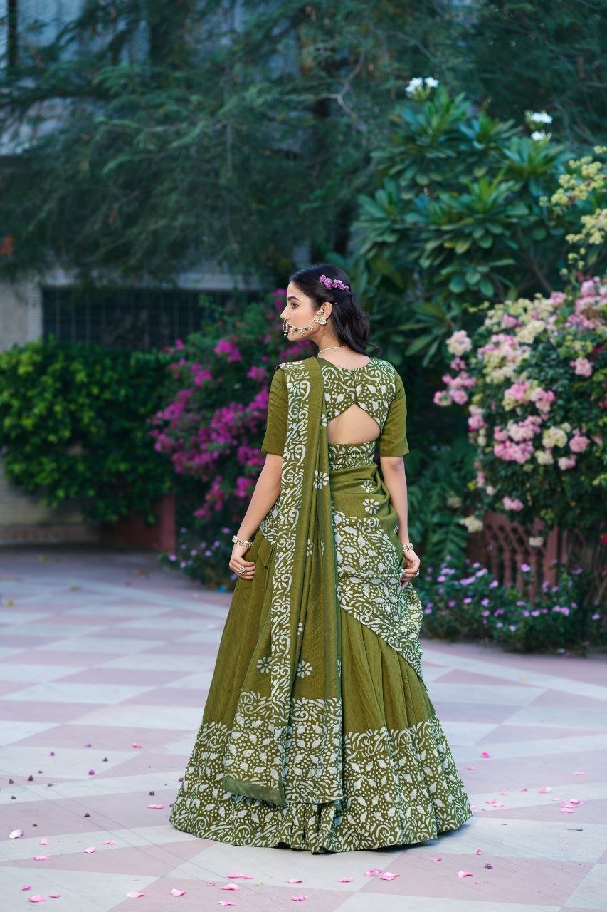 Dance Through Every Celebration in Timeless Crimson Bandhani Lehenga