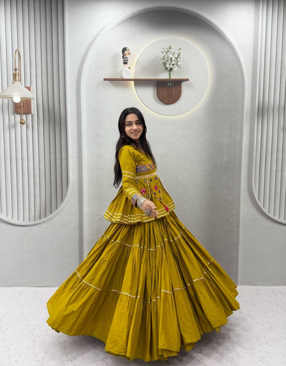 Tiered Flared Lehenga with Tasseled Embroidered Koti Jacket