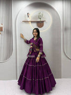 Tiered Flared Lehenga with Tasseled Embroidered Koti Jacket