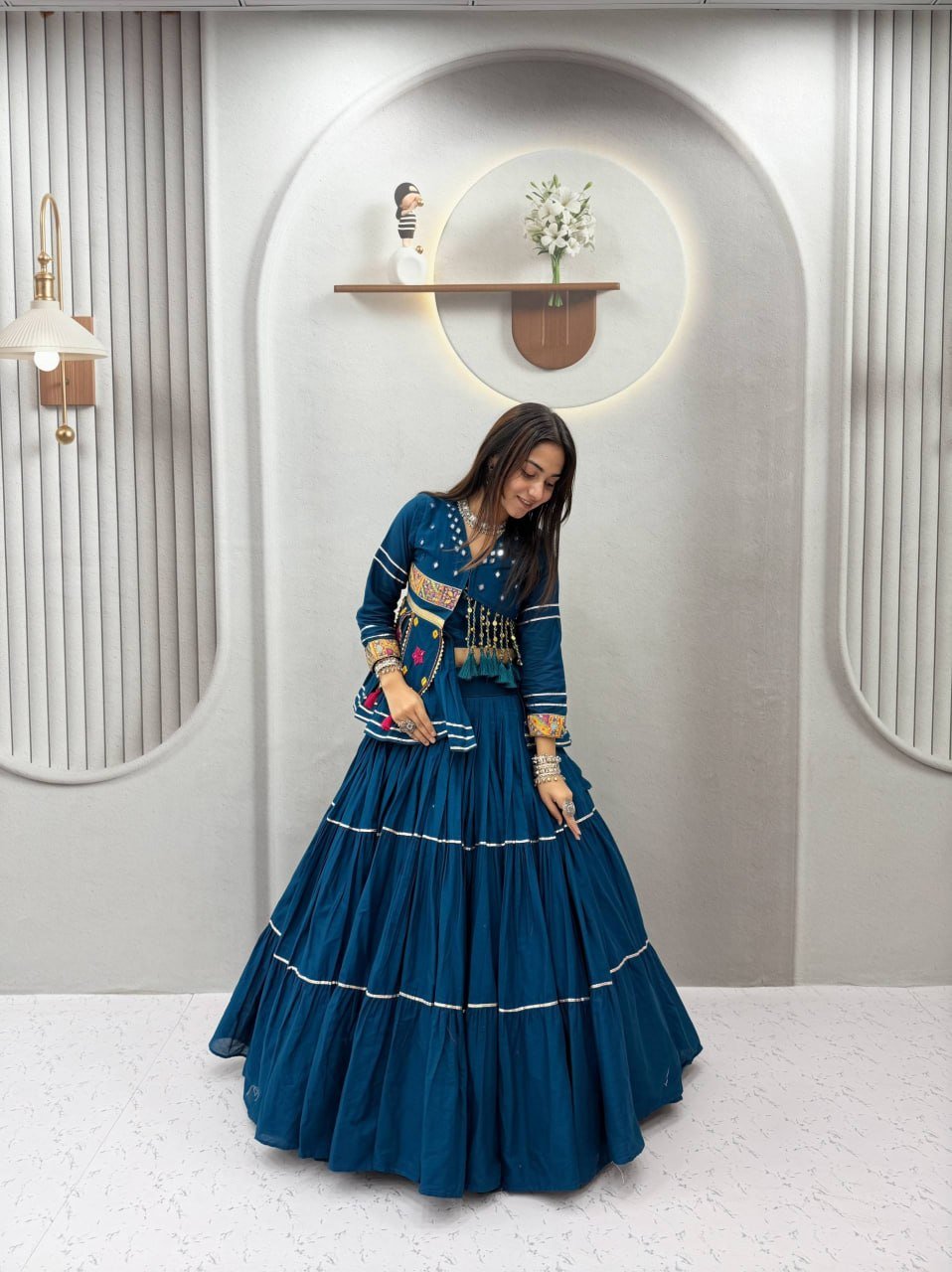Tiered Flared Lehenga with Tasseled Embroidered Koti Jacket