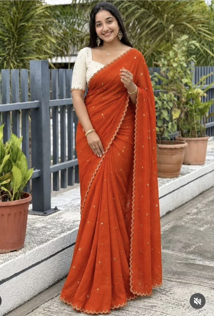 Embroidered Saree with Scalloped Border and Graceful Draping