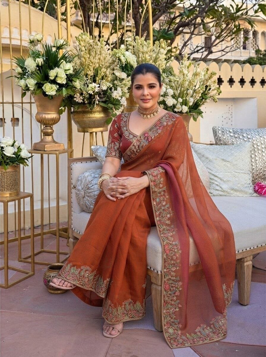 Radiate Royal Heritage in Delicately Thread-Worked Floral Border Saree