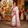 Festive Floral Embroidered Saree with Traditional Artisanal Detailing