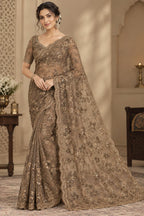 Opulent Floral Embroidered Net Saree with Scalloped Border and Matching Blouse