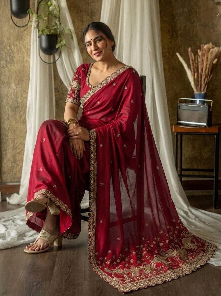 Regal Tradition Embroidered Saree with Ornate Peacock Border