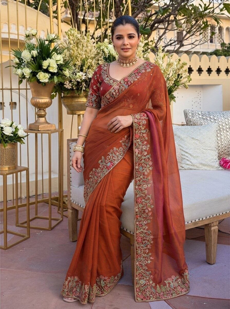 Radiate Royal Heritage in Delicately Thread-Worked Floral Border Saree