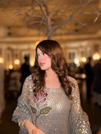 Royal Heritage Embroidered Anarkali Suit Ensemble With Intricate Floral Motifs and Shimmering Details