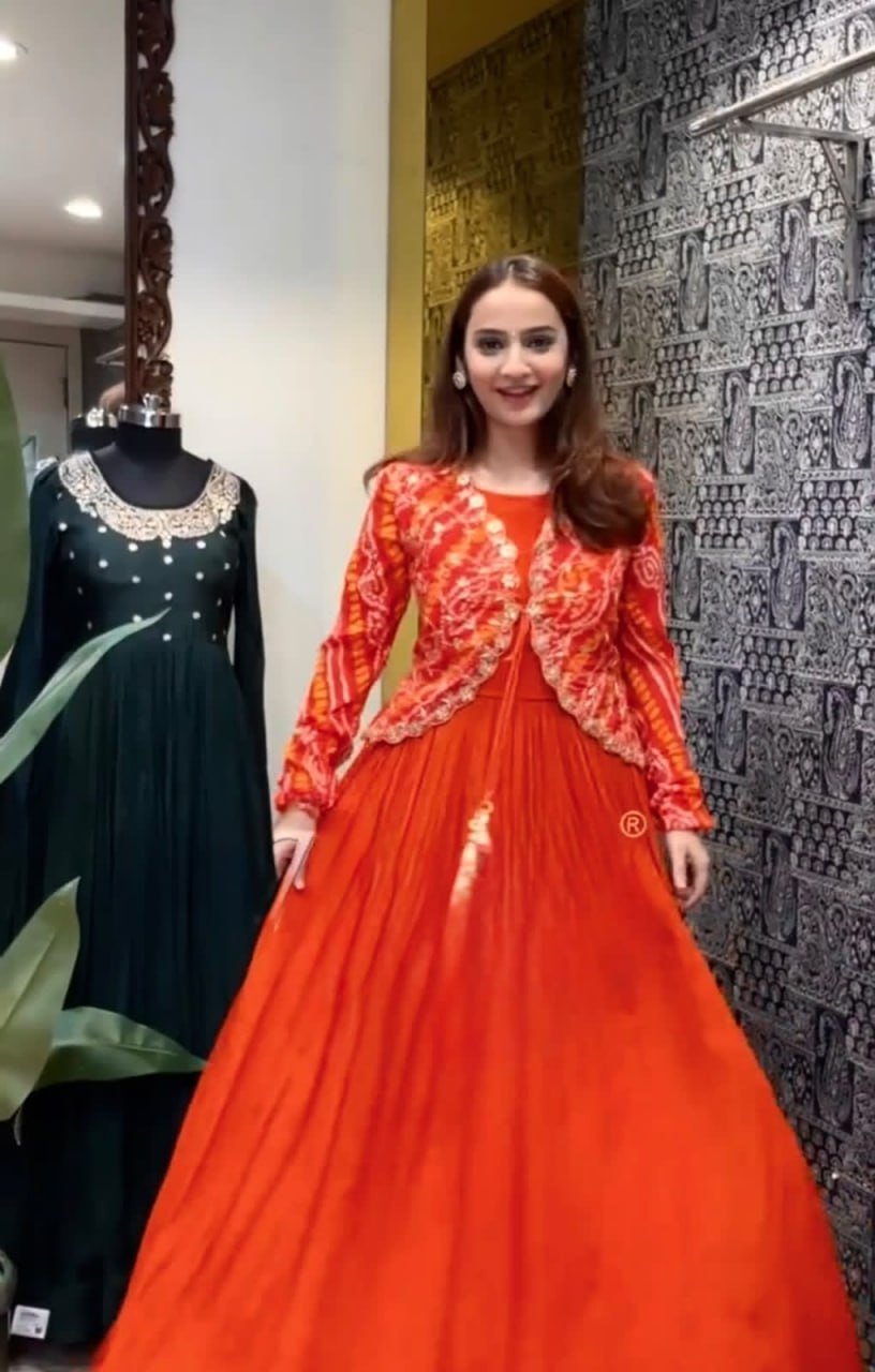 Festive Pleated Gown Ensemble with Embellished Jacket and Sheer Dupatta
