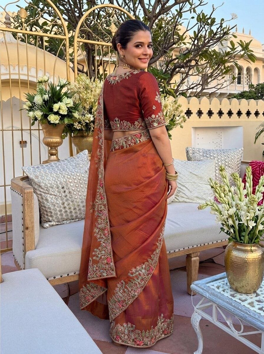 Radiate Royal Heritage in Delicately Thread-Worked Floral Border Saree