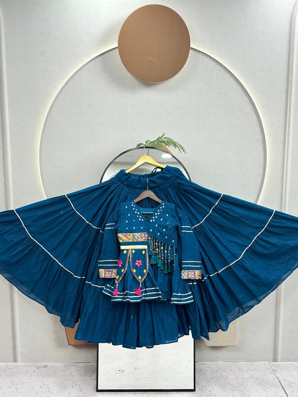 Tiered Flared Lehenga with Tasseled Embroidered Koti Jacket