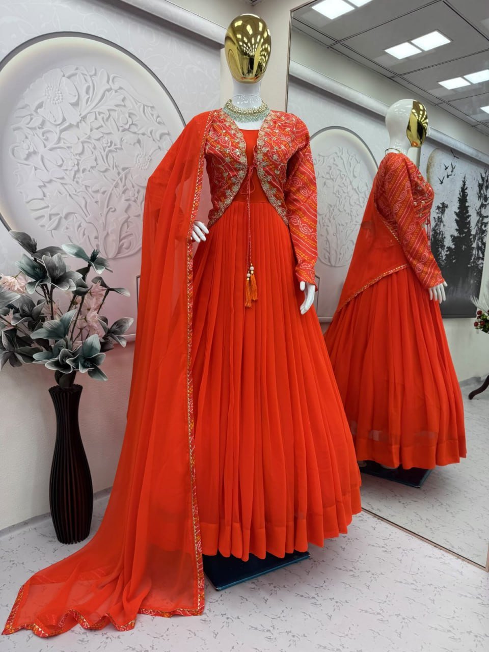 Festive Pleated Gown Ensemble with Embellished Jacket and Sheer Dupatta