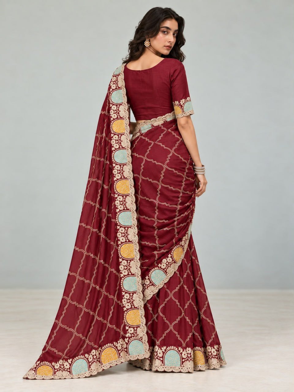 Royal Heritage Geometric Embroidered Saree with Multicolour Zari Border and Intricate Designer Blouse