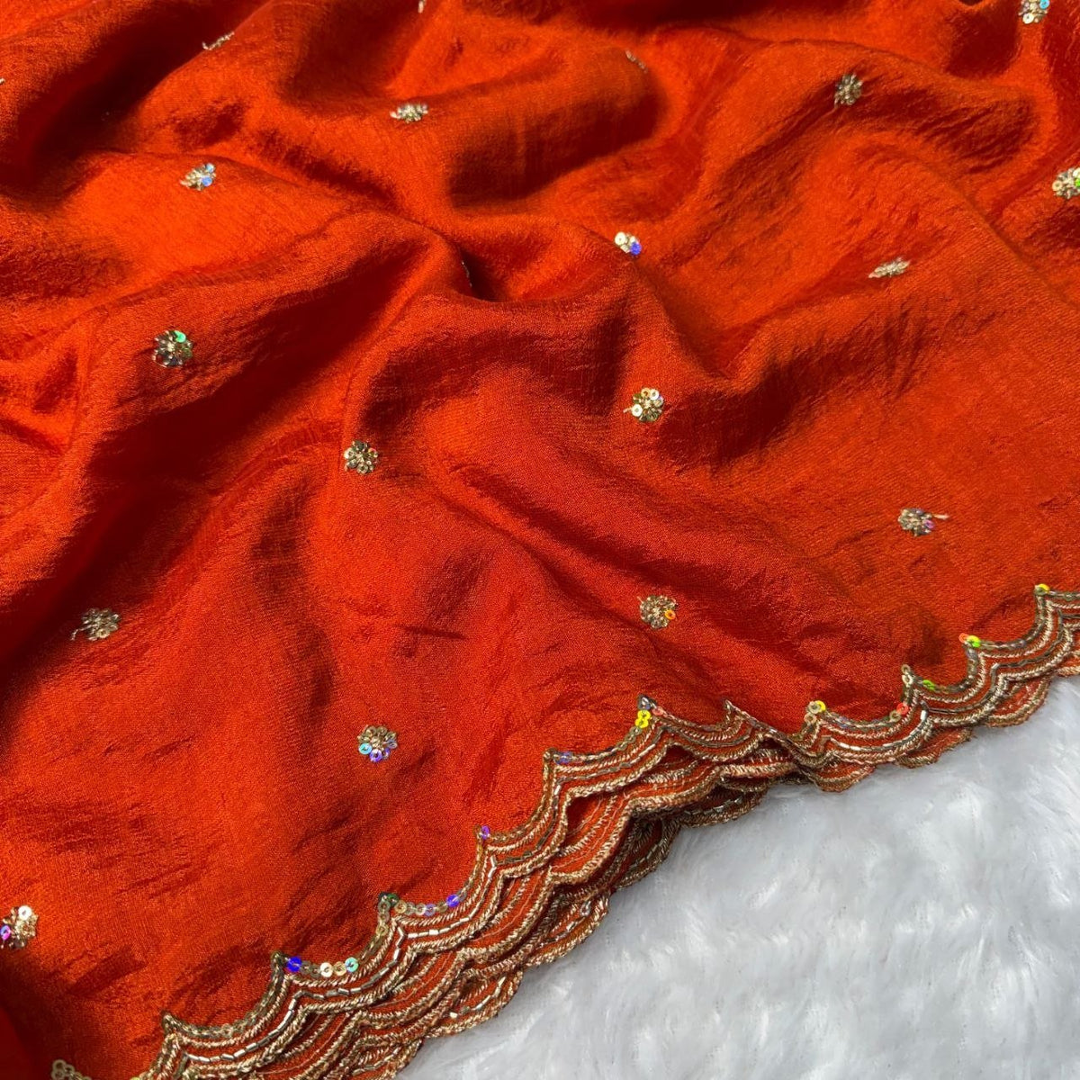 Embroidered Saree with Scalloped Border and Graceful Draping