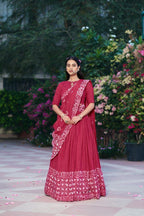 Dance Through Every Celebration in Timeless Crimson Bandhani Lehenga