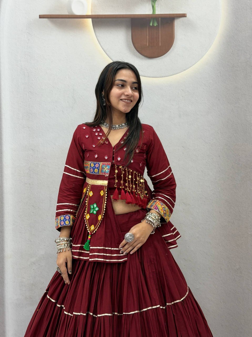 Tiered Flared Lehenga with Tasseled Embroidered Koti Jacket
