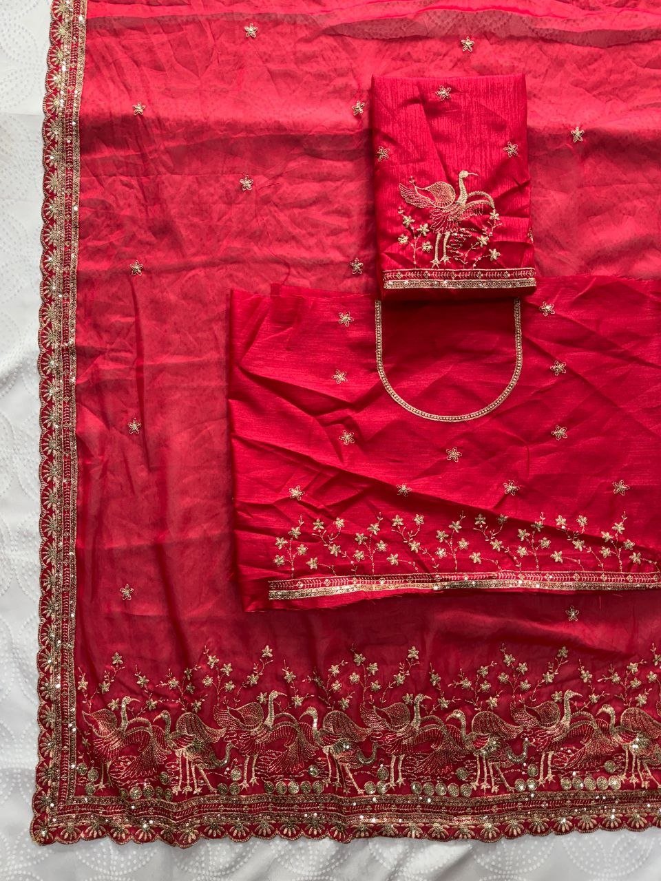 Regal Tradition Embroidered Saree with Ornate Peacock Border