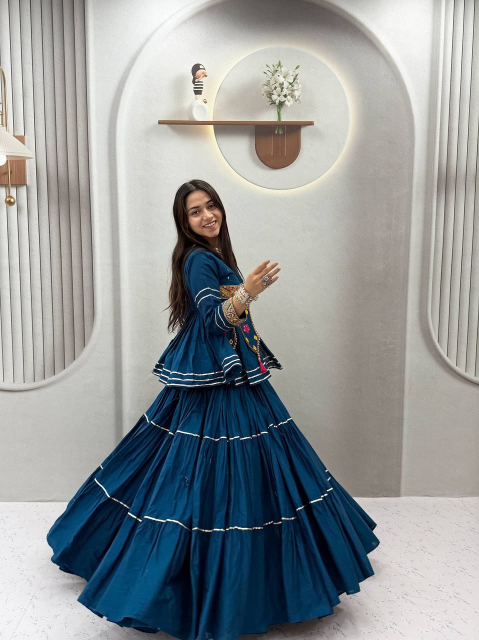 Tiered Flared Lehenga with Tasseled Embroidered Koti Jacket