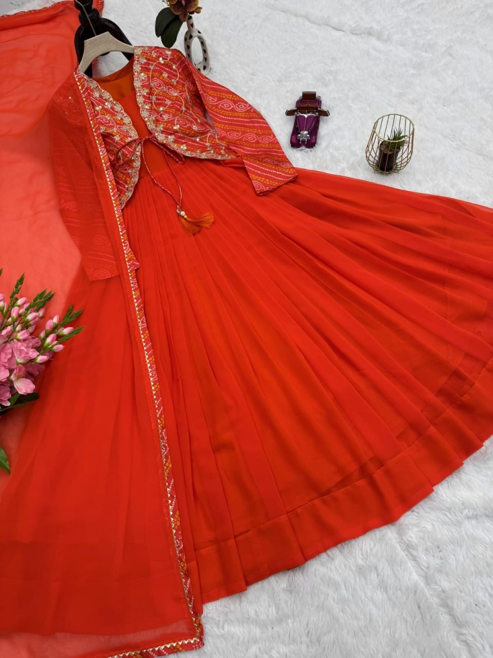 Festive Pleated Gown Ensemble with Embellished Jacket and Sheer Dupatta