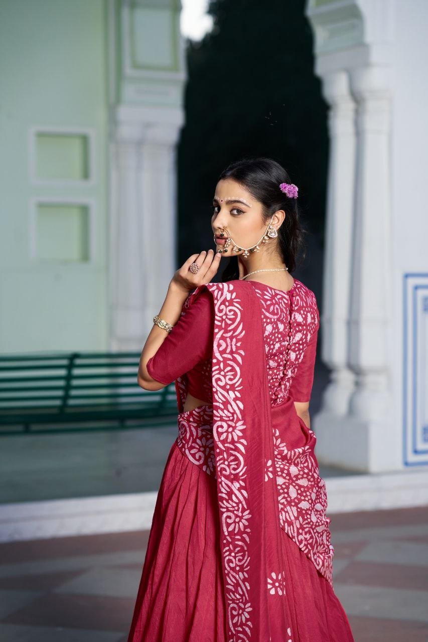 Dance Through Every Celebration in Timeless Crimson Bandhani Lehenga