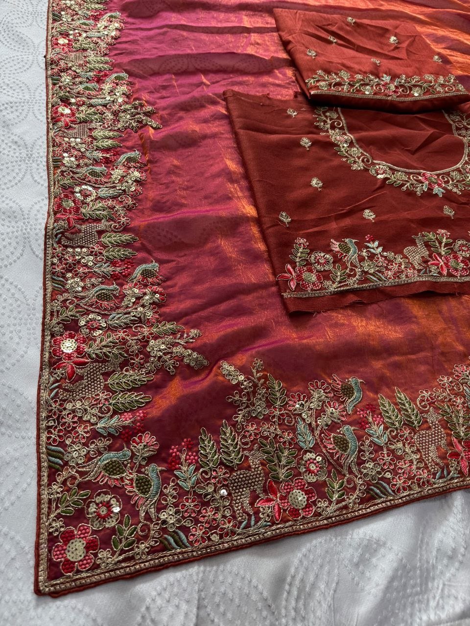 Radiate Royal Heritage in Delicately Thread-Worked Floral Border Saree