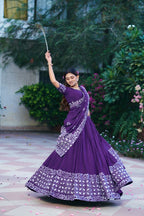 Dance Through Every Celebration in Timeless Crimson Bandhani Lehenga