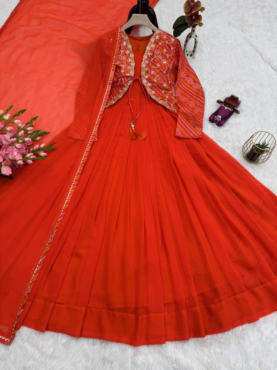Festive Pleated Gown Ensemble with Embellished Jacket and Sheer Dupatta