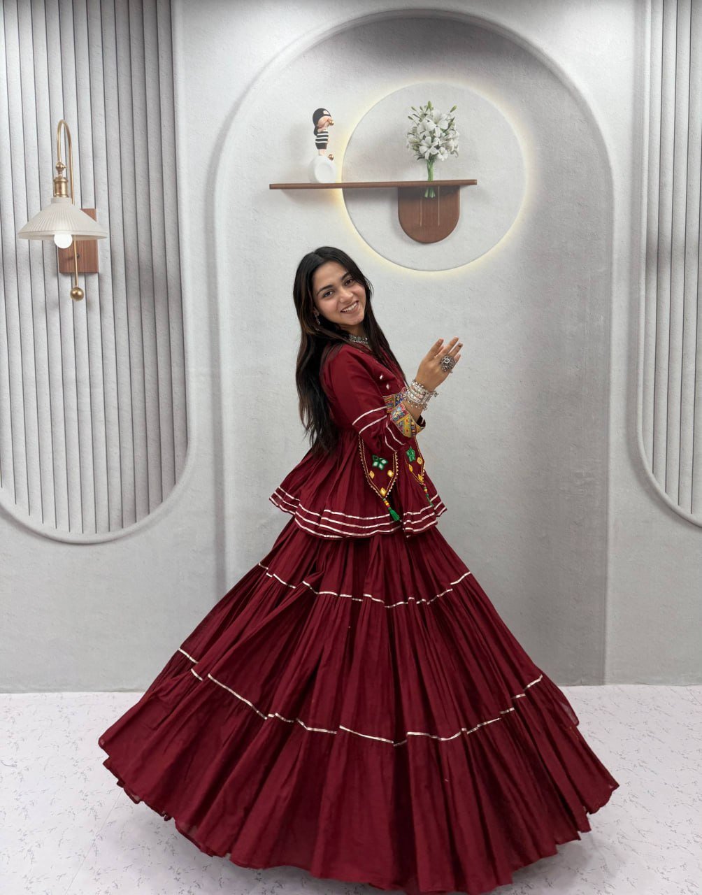 Tiered Flared Lehenga with Tasseled Embroidered Koti Jacket