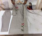 Royal Heritage Embroidered Anarkali Suit Ensemble With Intricate Floral Motifs and Shimmering Details