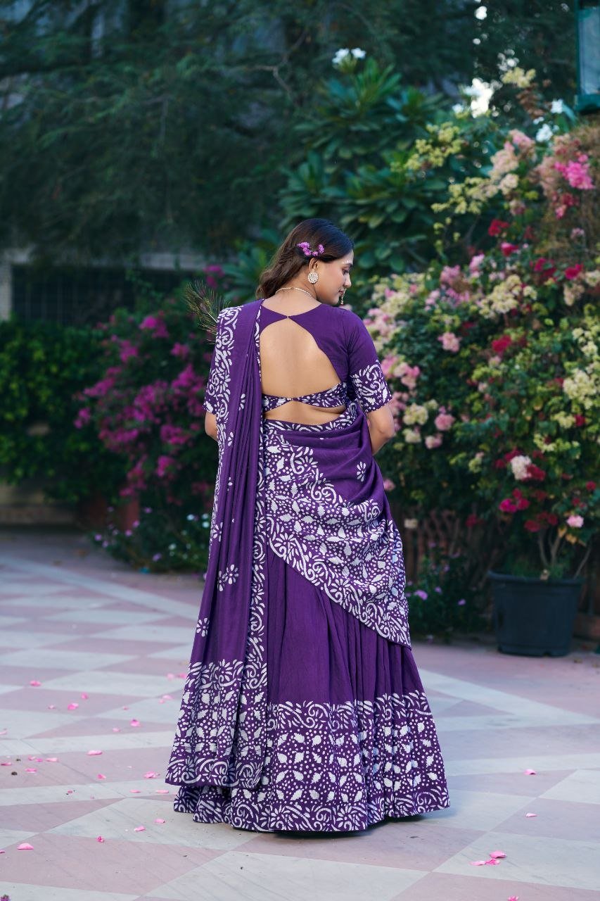 Dance Through Every Celebration in Timeless Crimson Bandhani Lehenga