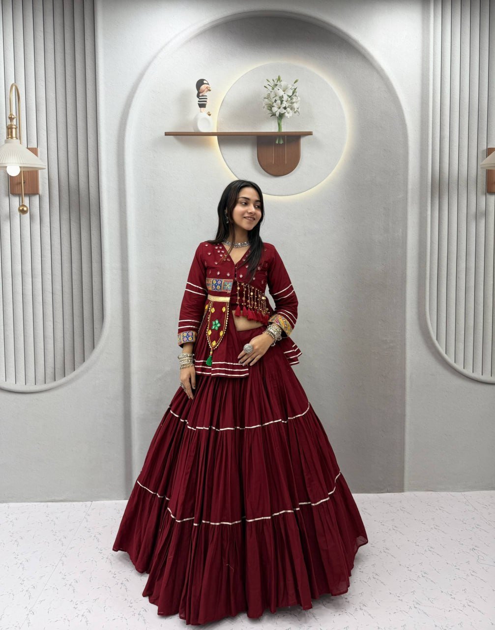 Tiered Flared Lehenga with Tasseled Embroidered Koti Jacket