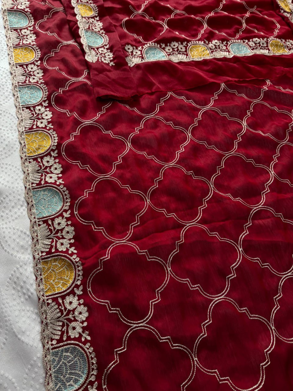 Royal Heritage Geometric Embroidered Saree with Multicolour Zari Border and Intricate Designer Blouse