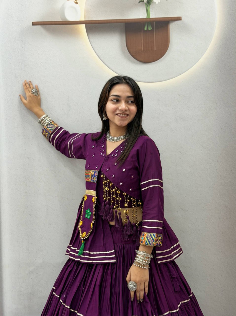 Tiered Flared Lehenga with Tasseled Embroidered Koti Jacket