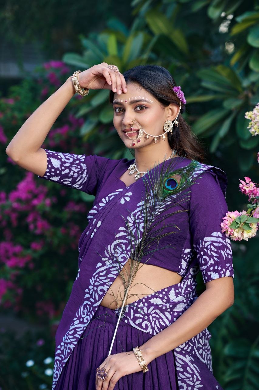 Dance Through Every Celebration in Timeless Crimson Bandhani Lehenga
