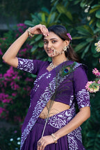 Dance Through Every Celebration in Timeless Crimson Bandhani Lehenga