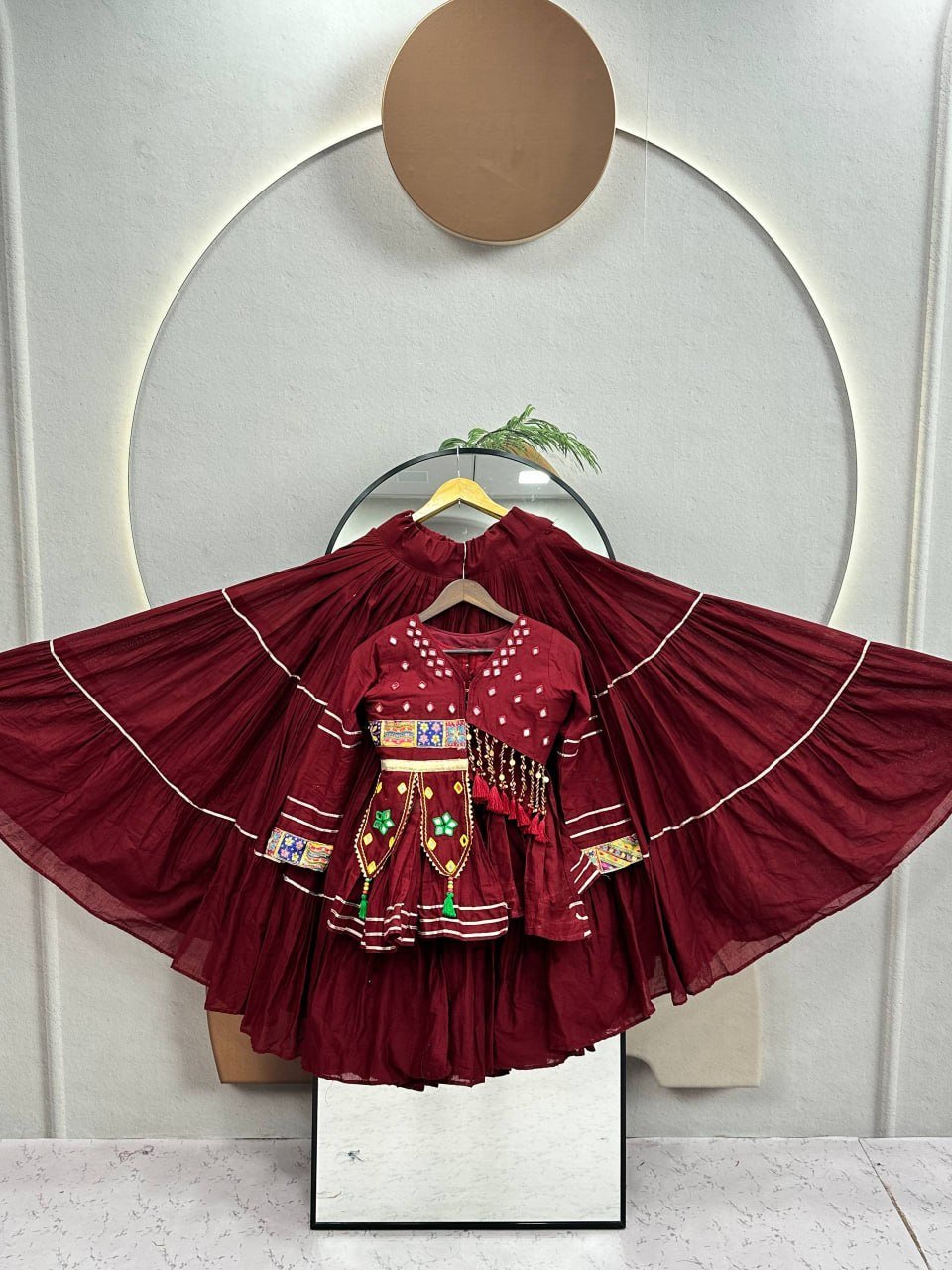 Tiered Flared Lehenga with Tasseled Embroidered Koti Jacket