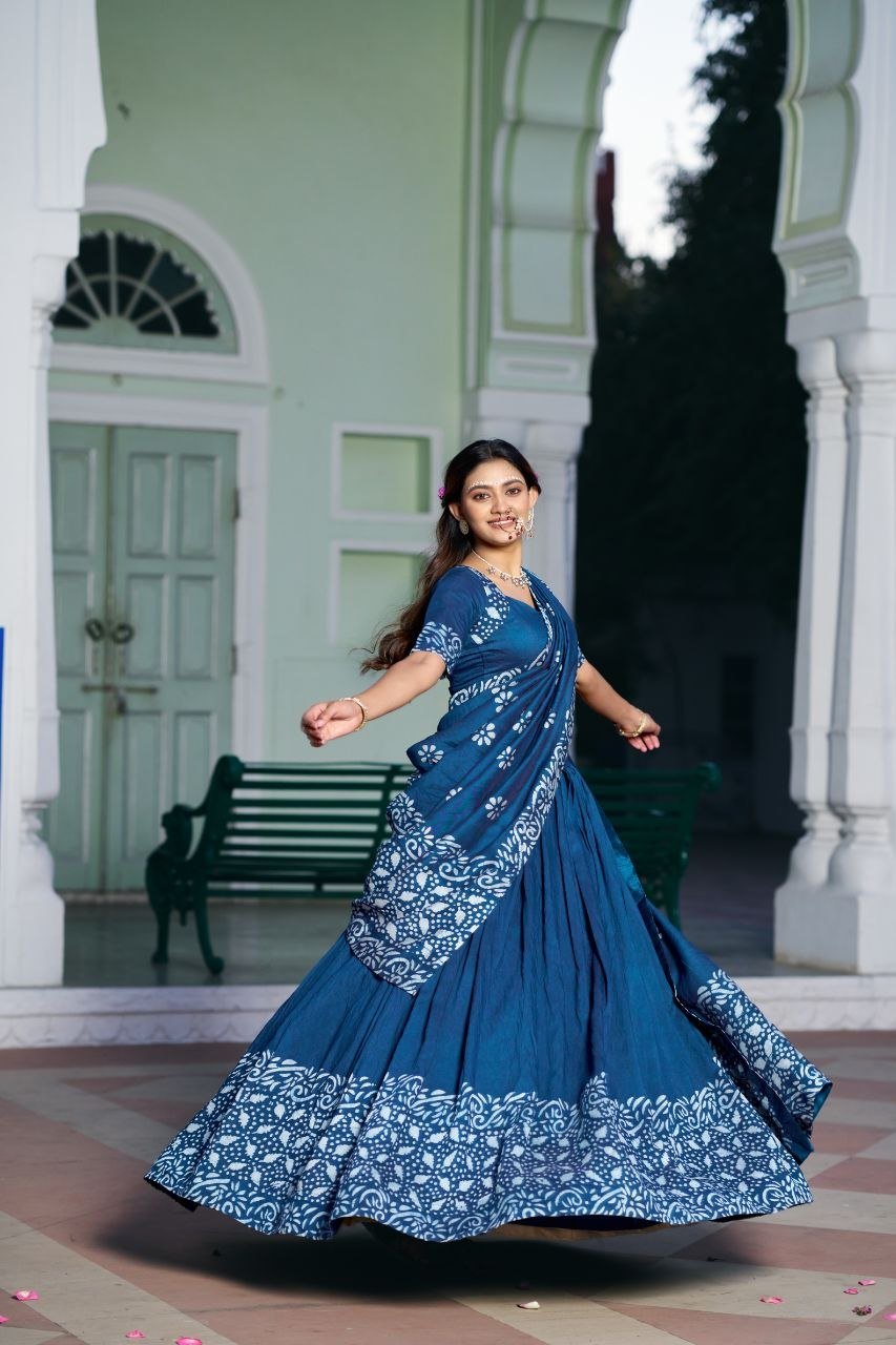 Dance Through Every Celebration in Timeless Crimson Bandhani Lehenga