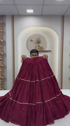 Tiered Flared Lehenga with Tasseled Embroidered Koti Jacket