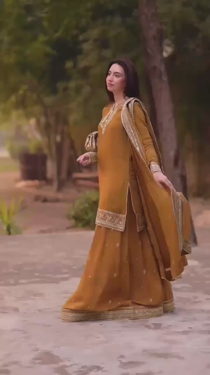 Regal Embroidered Kurta With Matching Sharara And Dupatta